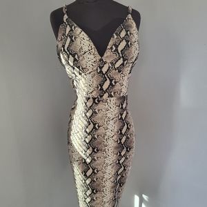 Large snake print dress size large worn only once. Stretchy fabric.